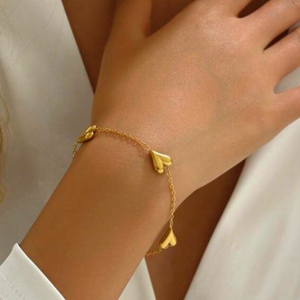 gold plated stainless steel three heart bracelet